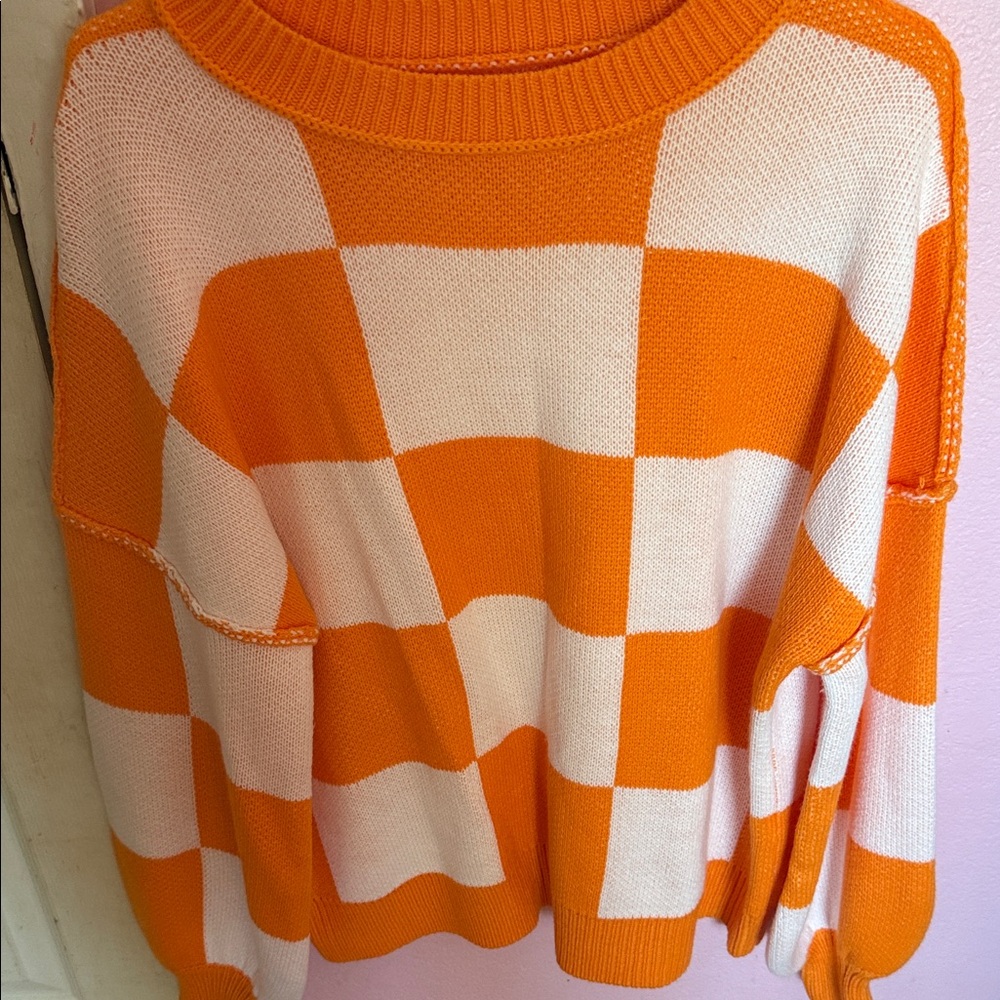 Vibrant Orange and White Checkered Sweater